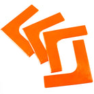 Throw Down Lines corner markers are bright orange, with textured underside & bevelled edges